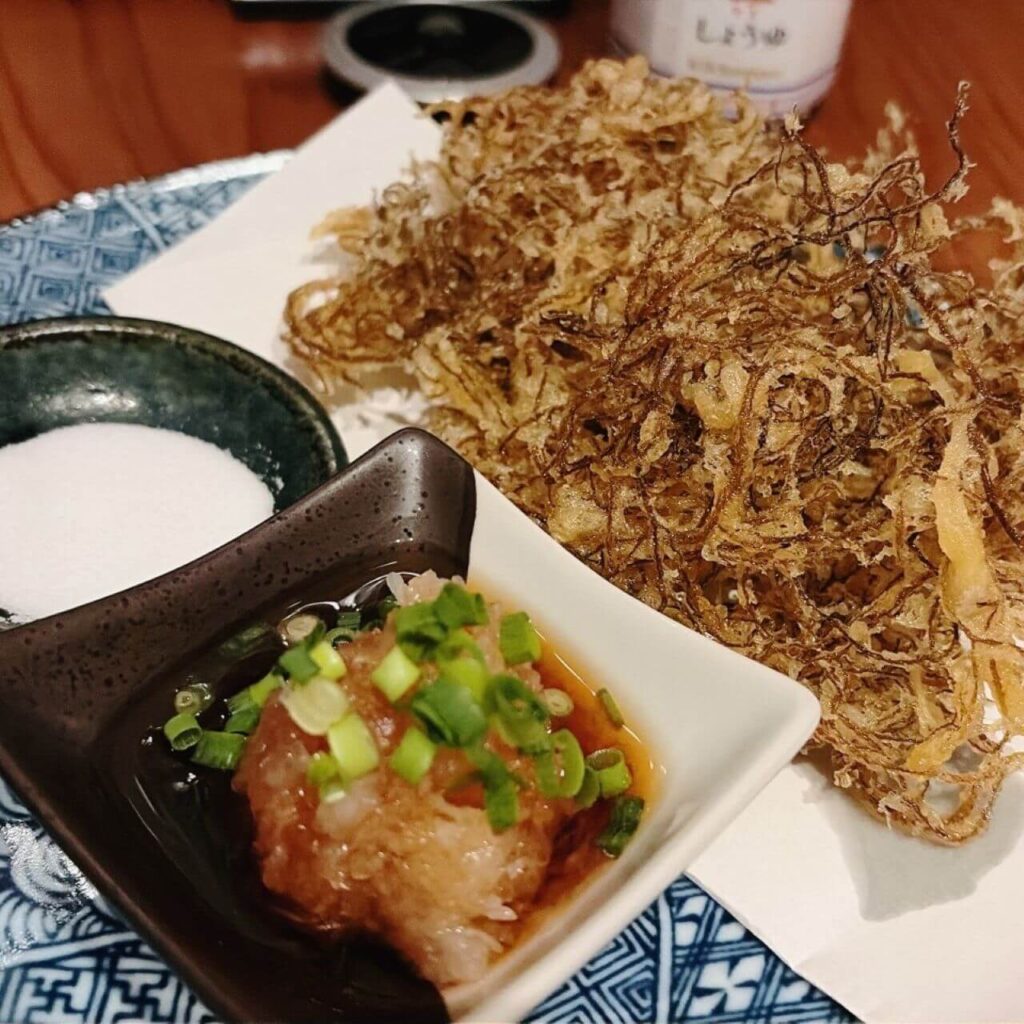 神栖市の居酒屋「めし呑み処 ラクロード」メニュー「もずくの天ぷら」
